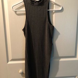 Sleeveless dress with side slit